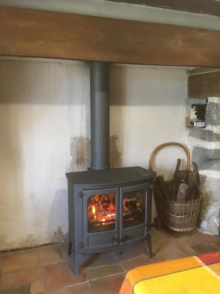 Pose d'un poêle à bois Pose d'un poêle à bois