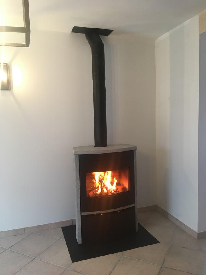 Pose d'un poêle Pose d'un poêle
