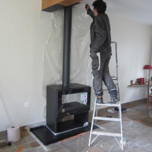 De la démolition de la cheminée à la pose du poêle